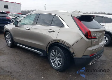 2022 Cadillac Xt4 Awd Premium Luxury from USA, damaged, VIN 1GYFZDR4XNF145297